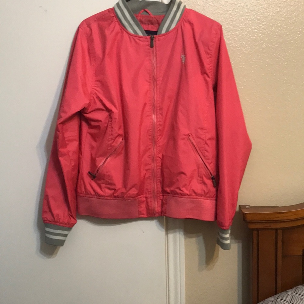 A white & pink polo jacket